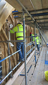 Restoration of the houses of parliament westminster hall north window by reyntiens glass studio