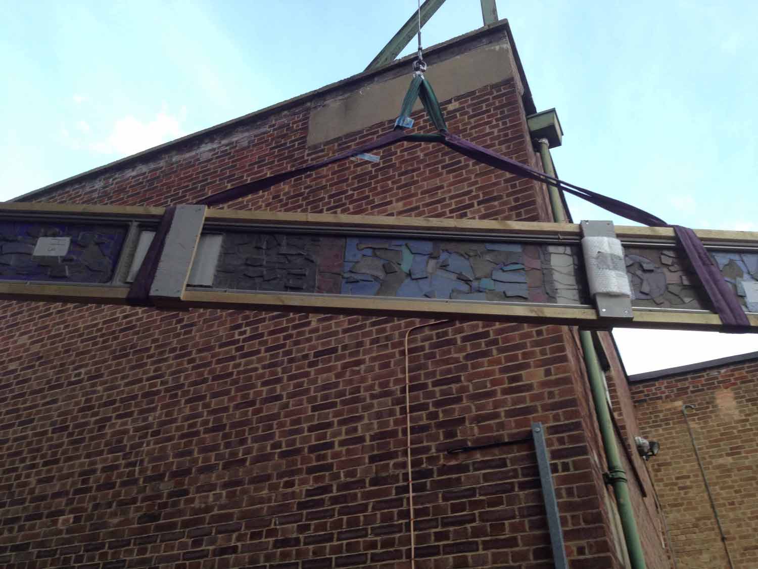 keith new commonwealth institue glass panels before restoration by reyntiens glass studio being crain lifted into studio
