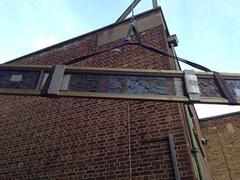 keith new commonwealth institue glass panels before restoration by reyntiens glass studio being crain lifted into studio