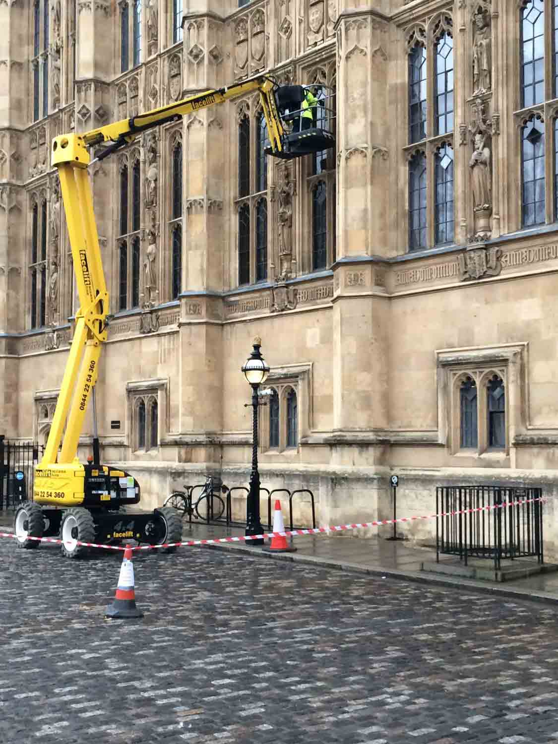 houses of parliament robing room stained glass restoration by reyntiens glass studio cleaning from a crane outside
